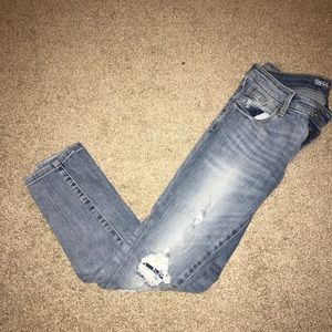 Mossimo skinny jeans with holes.